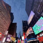 Buildings lit up in Times Square.