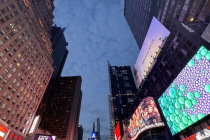 Buildings lit up in Times Square.