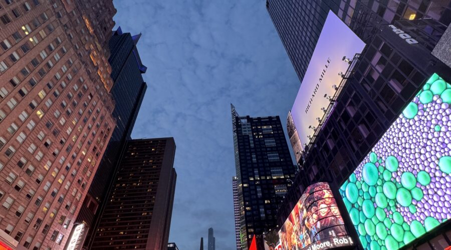 Buildings lit up in Times Square.