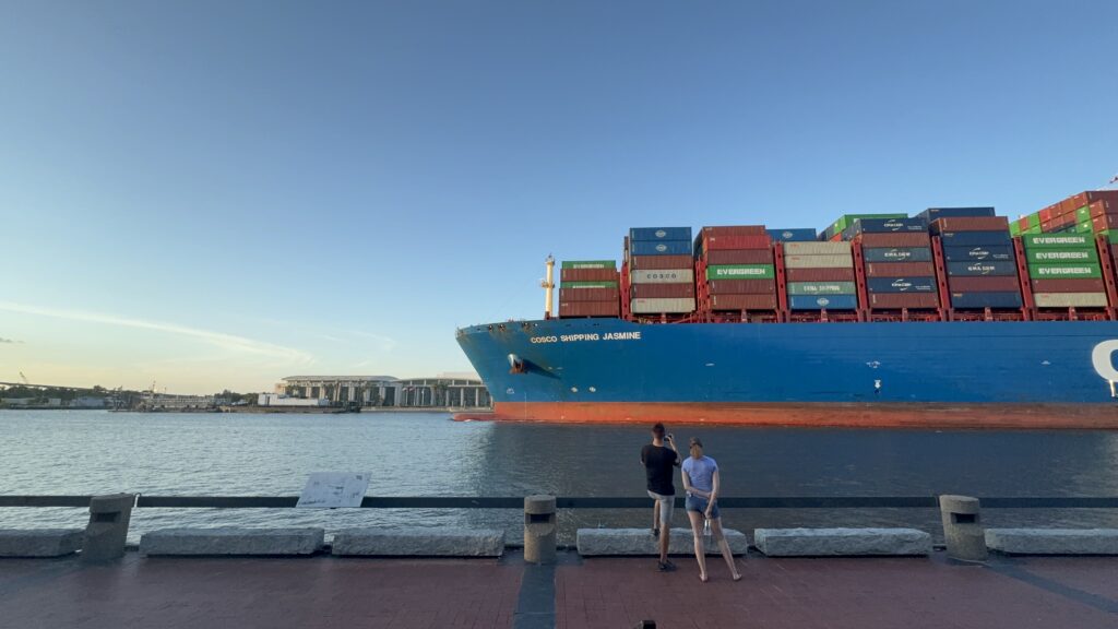 Cargo ship sailing on the Savannah river. Exploring Savannah.