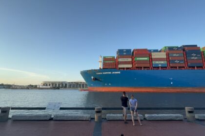 Cargo ship sailing on the Savannah river. Exploring Savannah.