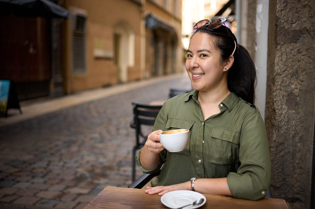 Woman drinking coffee.