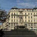 view of fountain and renaissance building in lyon france