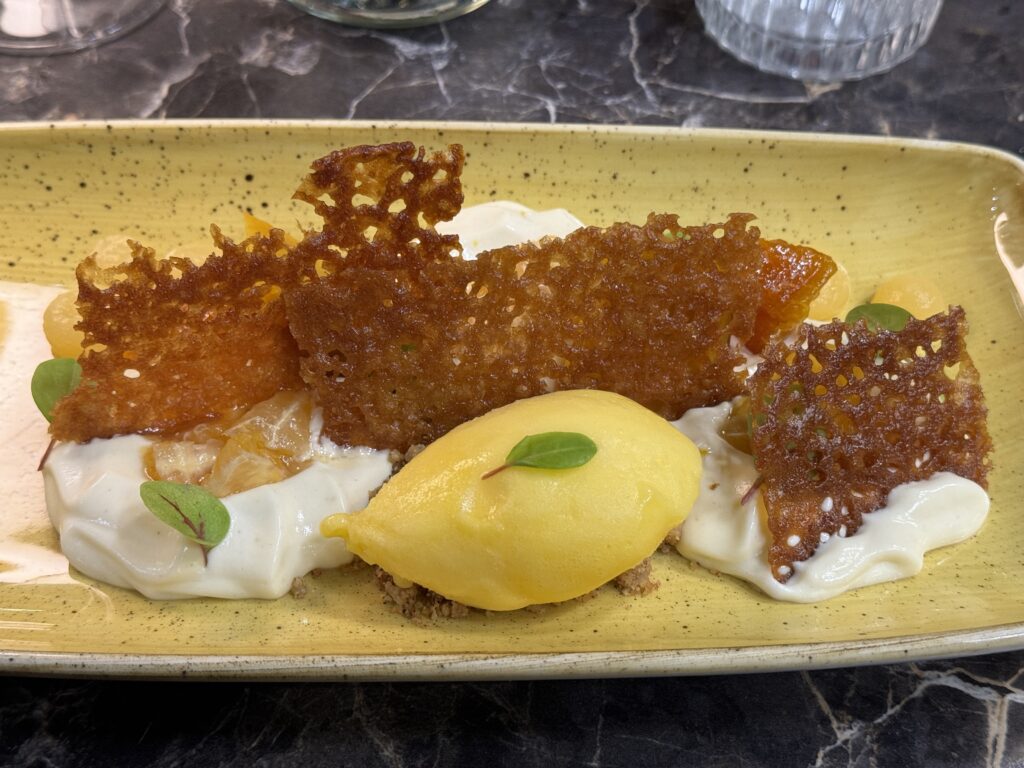 Citrus dessert dish at the restaurant les infidèles in lyon france