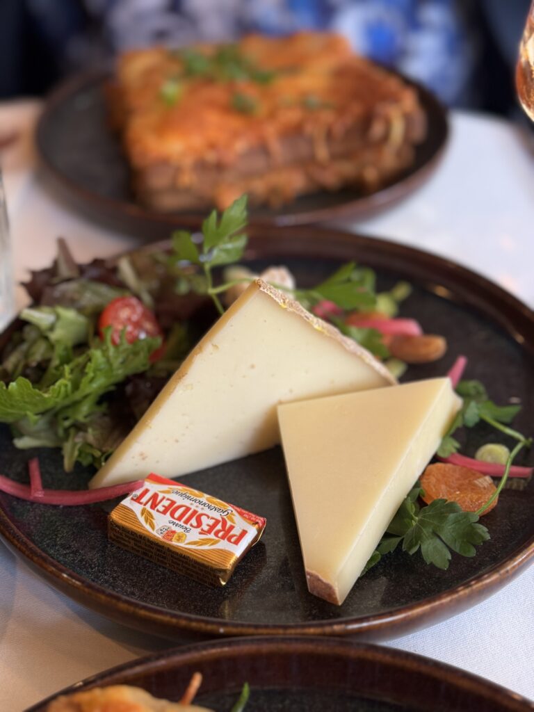 Cheeses on a plate in paris.