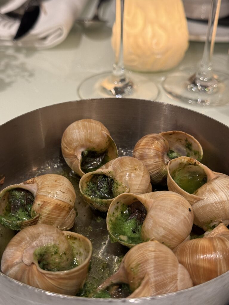 escargots in pan